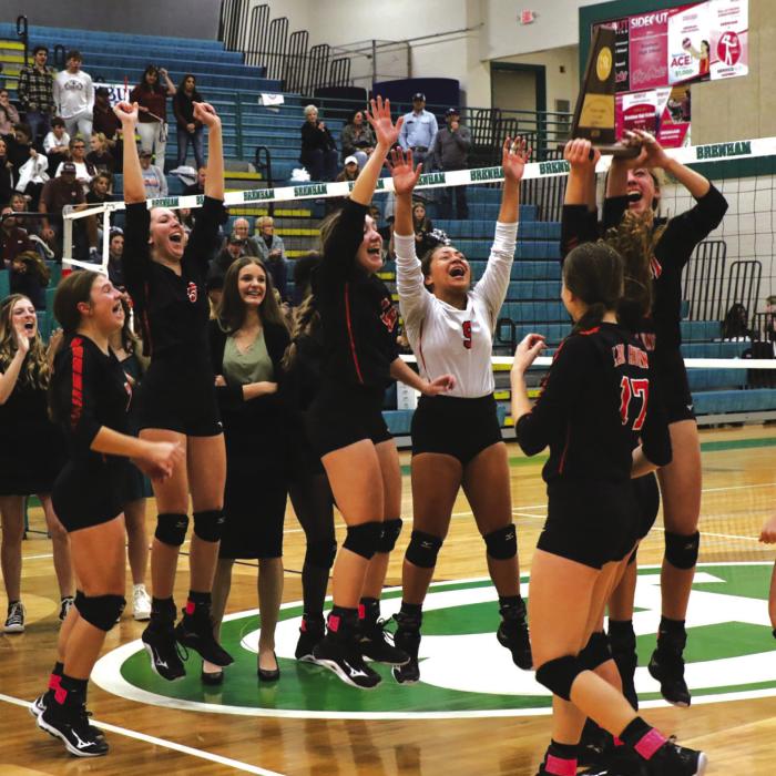 In a dominating two days of play at the regional tournament in Brenham, the Schulenburg volleyball team swept Three Rivers and Johnson City to earn a berth at this week’s 2A state tournament in Garland. Above, members of the Lady Horns celebrate as they are awarded the regional championship trophy. Photo by Audrey Kristynik