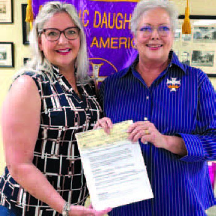 Roxanne Bailey, Sacred Heart Parish Business Administrator, accepted monetary donations for Vacation Bible School and the RE and SHOCK programs from Court Annunciation No. 1962 Regent Sherry Hebert.