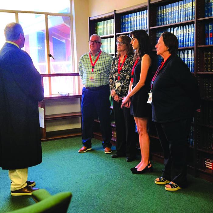 Scott Davis from La Grange, Pamela Quarles from Elgin,, Becky Herrin from Bastrop, and Mary Jo Kilpatrick from Cedar Creek were recently shown in as new CASA Advocates by Judge Eskew.