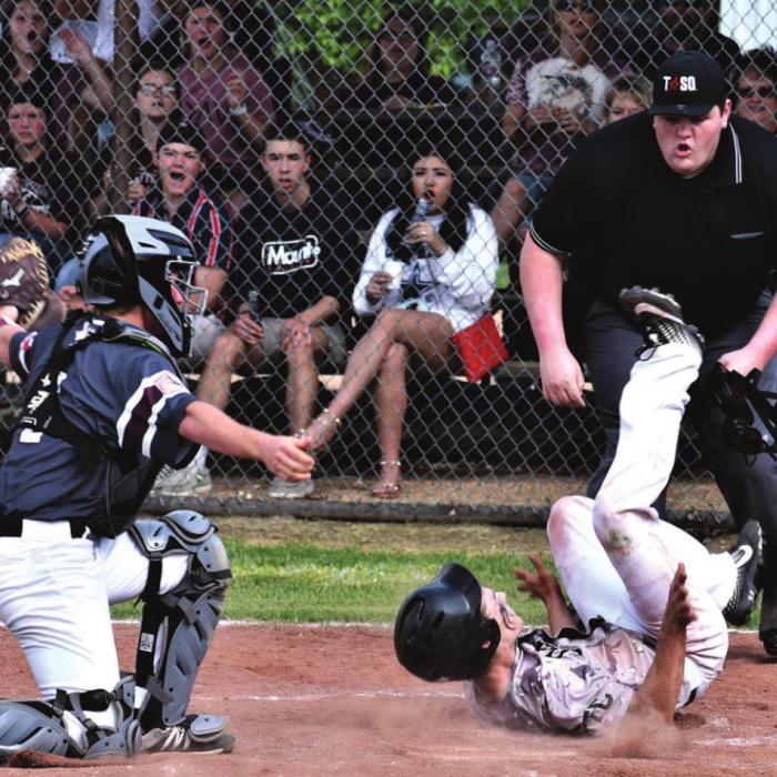 Bryan Lunbeck safe at home for the Cubs. Photos by Paul Kipp