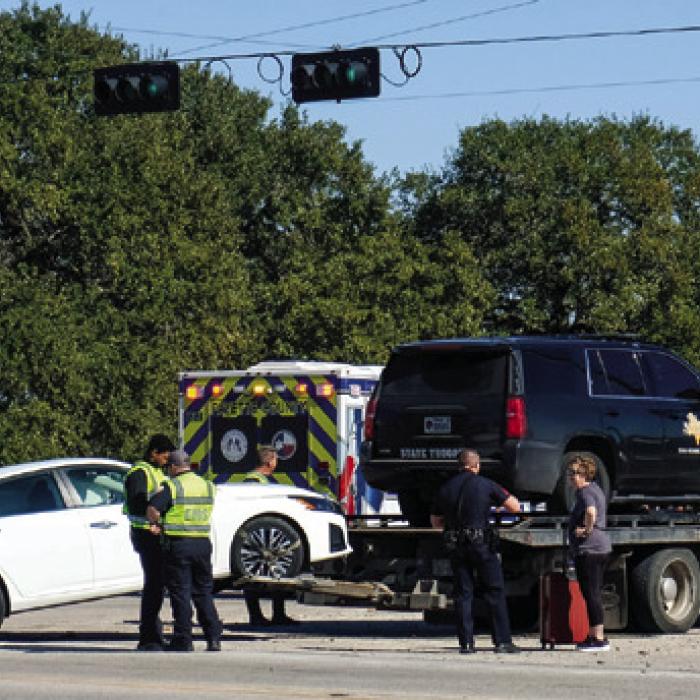 Folks passing the scene of a wreck on Business 71 in La Grange last Thursday may have noticed this State Trooper’s vehicle on the back of a tow truck. It wasn’t involved in the wreck, however. Photo by Andy Behlen