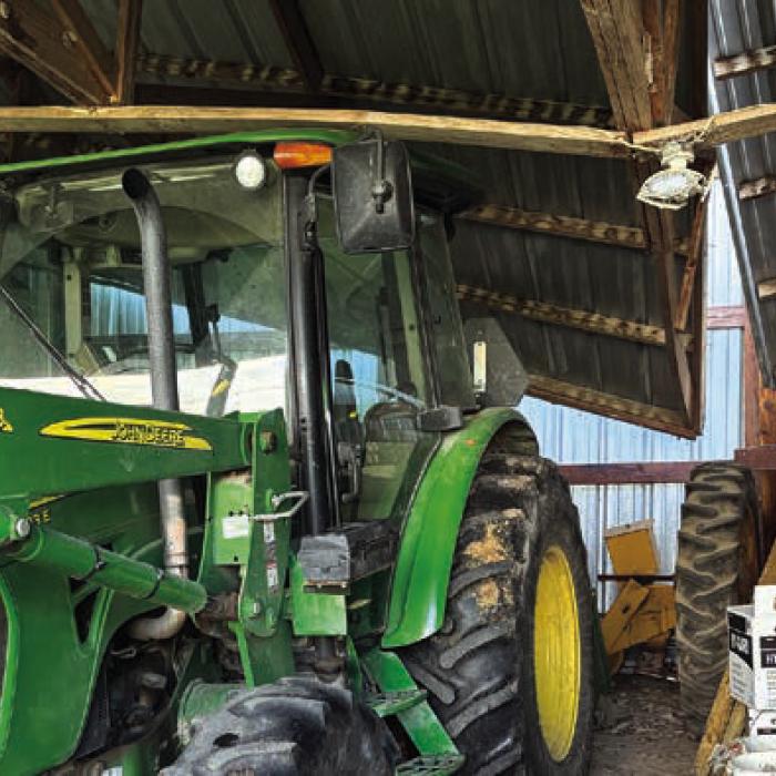 The barn shown here collapsed on some tractors Saturday evening after strong winds from a storm blew through the Daniel Cerny place one mile east of Praha. Cerny said a friend helped get one of the tractors out and prop the barn roof up with a new post. More storms blew through Fayette County Sunday night. Cerny said he’s had plenty of rain, by his count 16-17 inches in the past month in Praha.