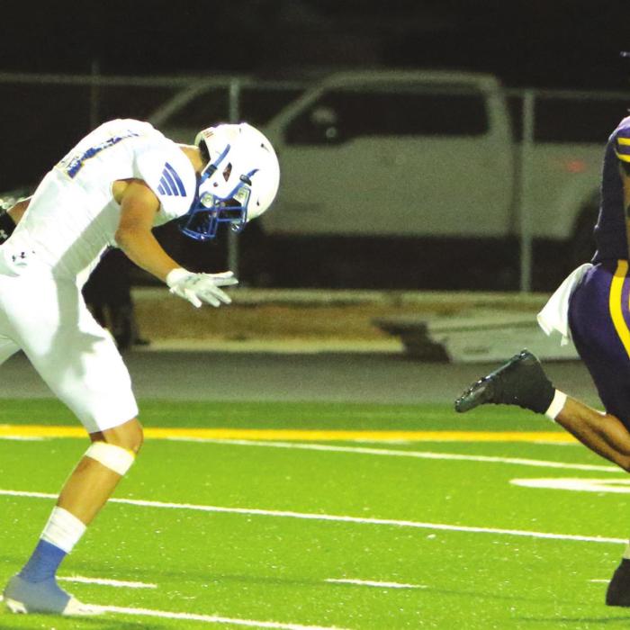 La Grange’s Bravion Rogers runs away from this Lago Vista defensive back on his way to one of his five touchdowns Friday, three rushing and two receiving. Photo by Darrell D. Gest