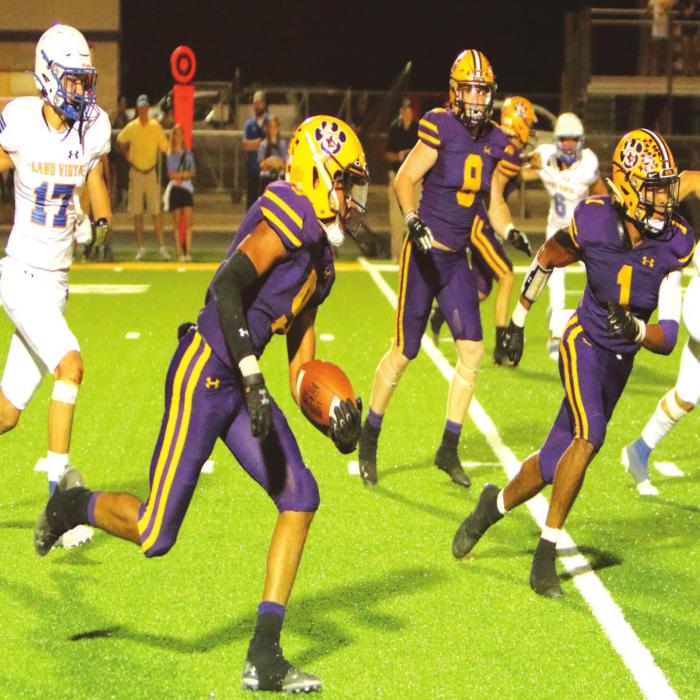 Jakobe Wilkerson is shown here amidst his 90-yard kickoff return for a touchdown Friday. Photo by Darrell D. Gest