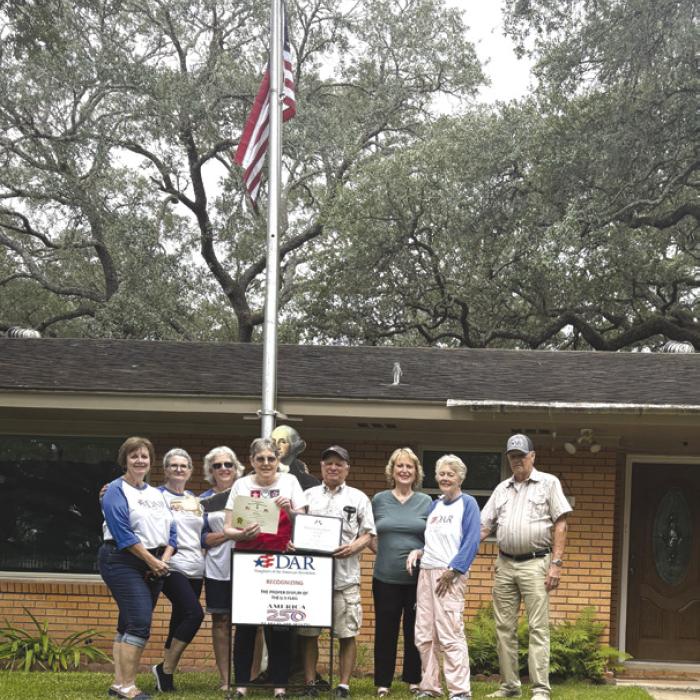 Pictured from left: Susan Glover, Donna Pustejovsky, Connie Dittrich, Robert and Sandy Chaloupka, Stephanie Mattix, Judy and David Zachmeyer. Making an appearance in the back was George Washington. Picture by Chanea Grisham.