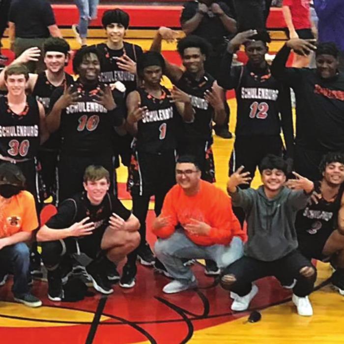 The Shorthorns pose after their last second victory over Weimar Saturday in Columbus.