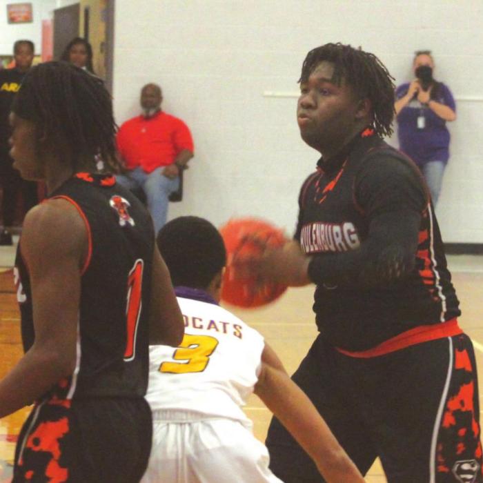 Schulenburg’s TJ Speed, left, and Kenny King, right, in action in Saturday’s playoff victory over Weimar. Photos by Brian Pierson
