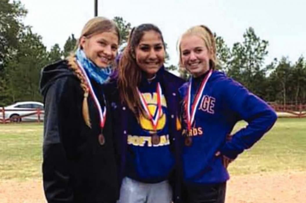 The La Grange girls medalists, left to right: Ellee Sodolak, Alyssa DelaRosa, and Julia Aymond.