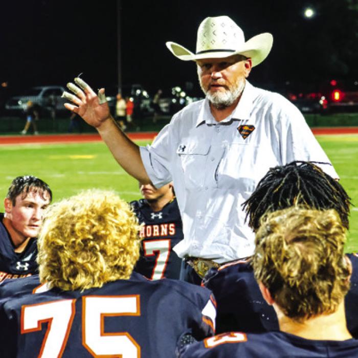 Hats Off to the New Coach