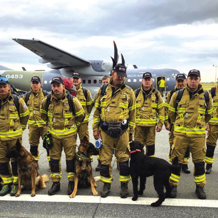A team of 16 firefighters and search K-9s from the Czech Republic’s elite Urban Search and Rescue team arrived in Texas last week to help search for people missing from the July 4 Hill Country floods. Photo by Czech Fire Rescue Service