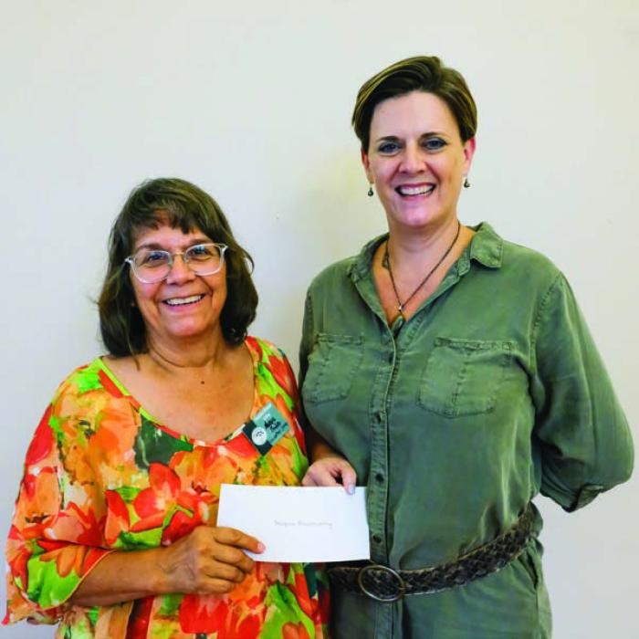 Hospice Brazos Valley received a $2,000 grant from the Texas Women’s League. Pictured are Margie McKee of Hospice Brazos Valley (left) and Ashley Bishop of TWL.