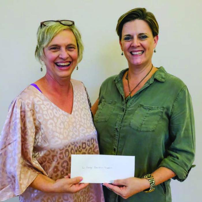 La Grange Education Support Program (LEPS) Foundation received a $2,000 grant from the Texas Women’s League. Pictured are Pam Keilers of the LEPS Foundation (left) and Ashley Bishop of TWL.