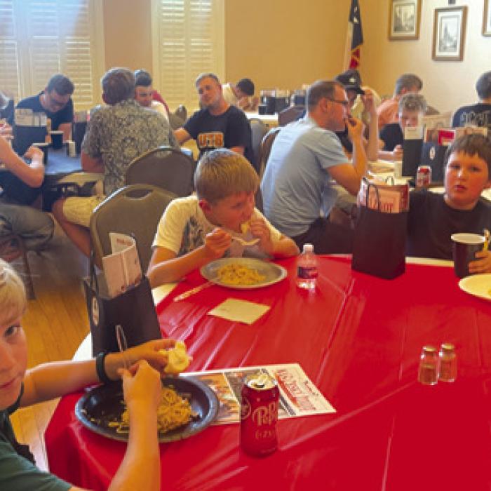 Band members, their sponsors and staff enjoy dinner at TCHCC.