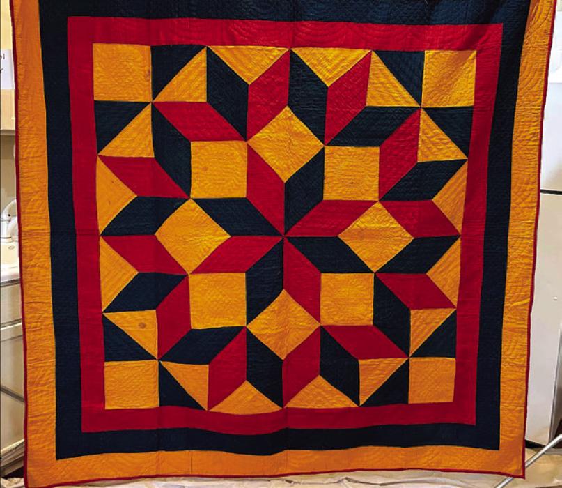 “Mennonite Carpenter’s Square,” a quilt from around 1890, part of the new exhibit at La Grange’s Texas Quilt Museum.