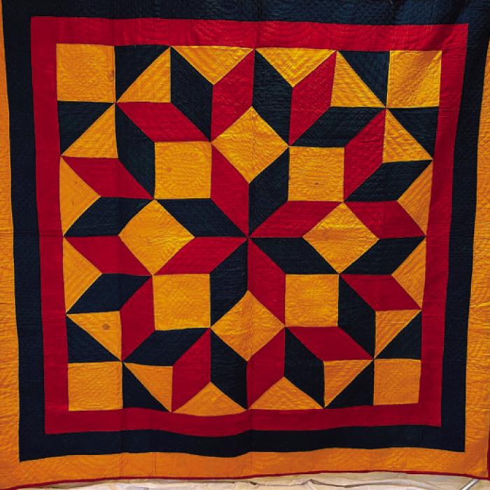 “Mennonite Carpenter’s Square,” a quilt from around 1890, part of the new exhibit at La Grange’s Texas Quilt Museum.