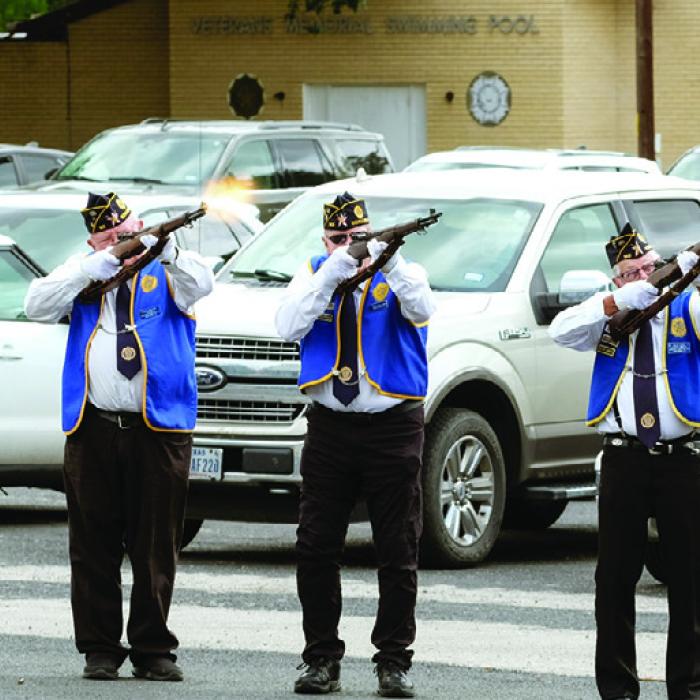 The honor guard fires a three-volley salute at the conclusion of the Memorial Day service in Schulenburg Monday. More on the event on Page B2 today. Photo by Andy Behlen
