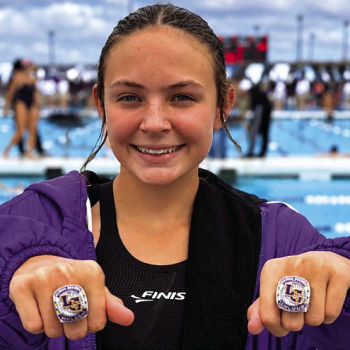 Adysen Janacek – School Record Breaker in the 50 Free and 100 Free.