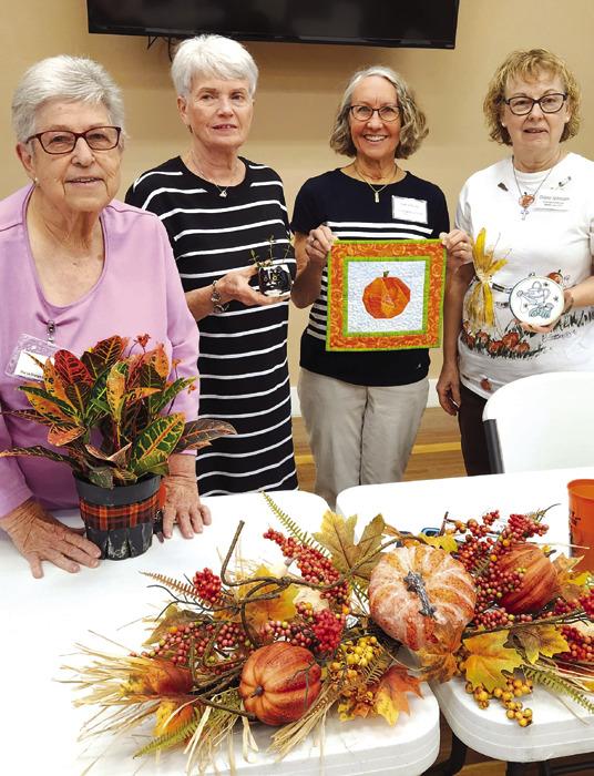 Four La Grange Garden Club members were delighted to win door prizes at the October meeting. Deborah Bradley of the Texas Quilt Museum shared with the group the background of the Museum and Grandmother’s Garden.