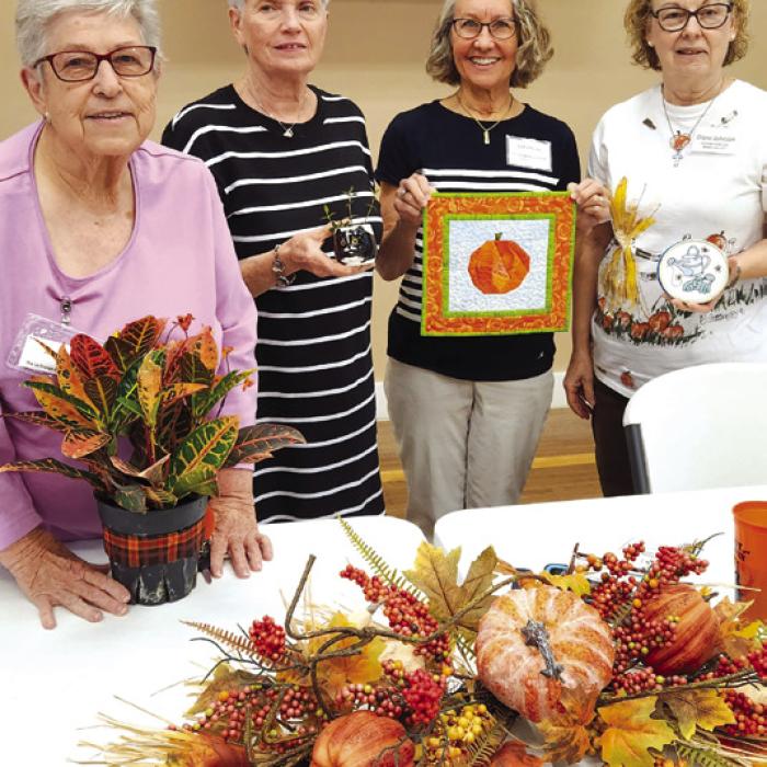 Four La Grange Garden Club members were delighted to win door prizes at the October meeting. Deborah Bradley of the Texas Quilt Museum shared with the group the background of the Museum and Grandmother’s Garden.