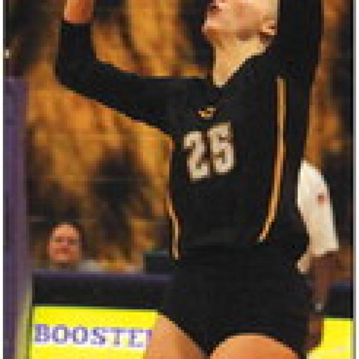 La Grange’s Kylie Trlicek sets a ball in Tuesday’s match against Caldwell. Photo by Jeff Wick