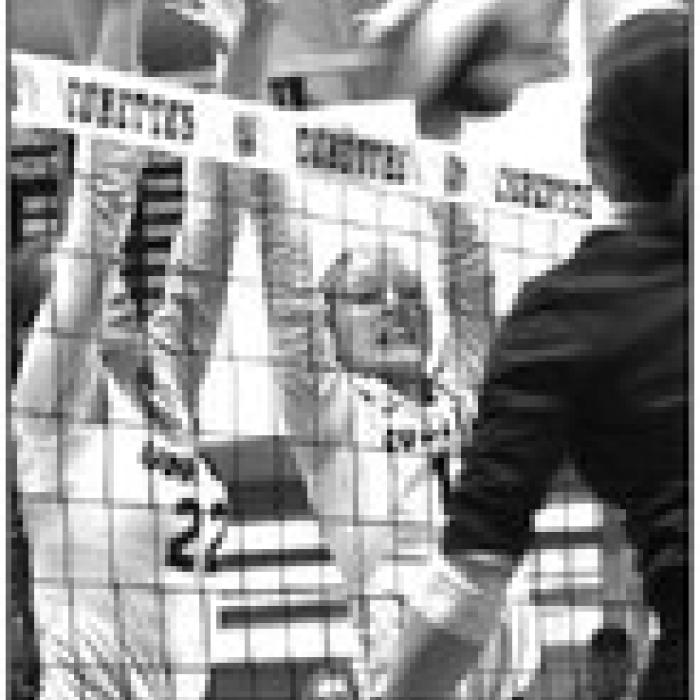 Round Top-Carmine’s Kennedy Flinn and Jessica Rohde with a block Tuesday. Photo by Paul Kipp