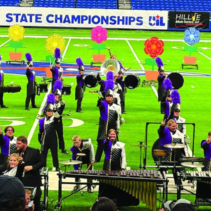The La Grange band marches on the field at the Alamodome in San Antonio Wednesday morning during their performance at the 4A state marching competition. Photo by Regina Keilers