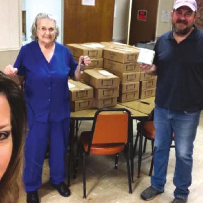 Kelly Franke, Mary Ann Firaek and Kenny Couch all helping with Meals on Wheels.
