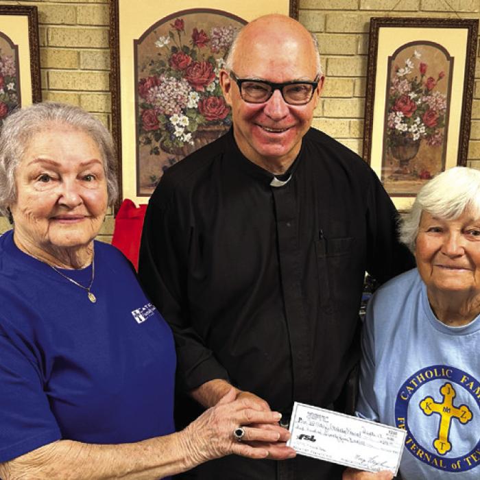 Members of Annunciation KJZT #41 of Ellinger donated a check for $675 to Father Steve Sauser from their annual fundraiser. President Gladys Polasek and Secretary Mary Vrazel did the presentation. Gladys is on the left in the picture, and Mary is on the right. The date of the donation was Tuesday September 22.