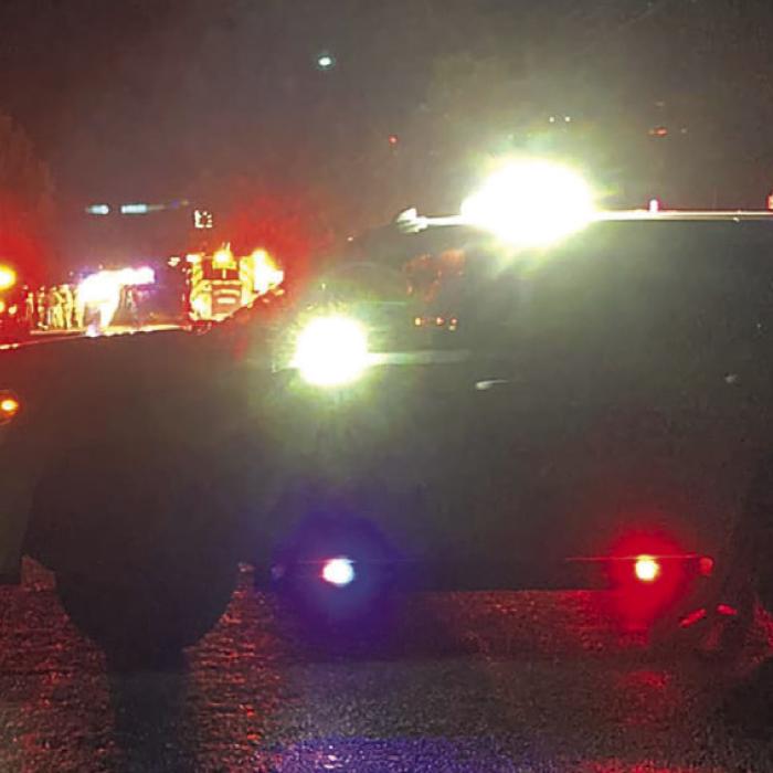Highway 159 in Rutersville was closed by first responders (above) in the aftermath of Saturday’s fatal collision.