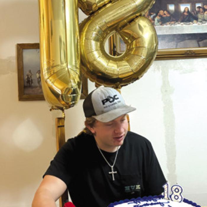 Kasen Kocian blew out his 18th birthday candles with family on Saturday, Feb. 15. His dad, Wayne Kocian, cooked hamburgers just before the rain and wind blew in Saturday evening. Family gathered for good conversation and delicious food.