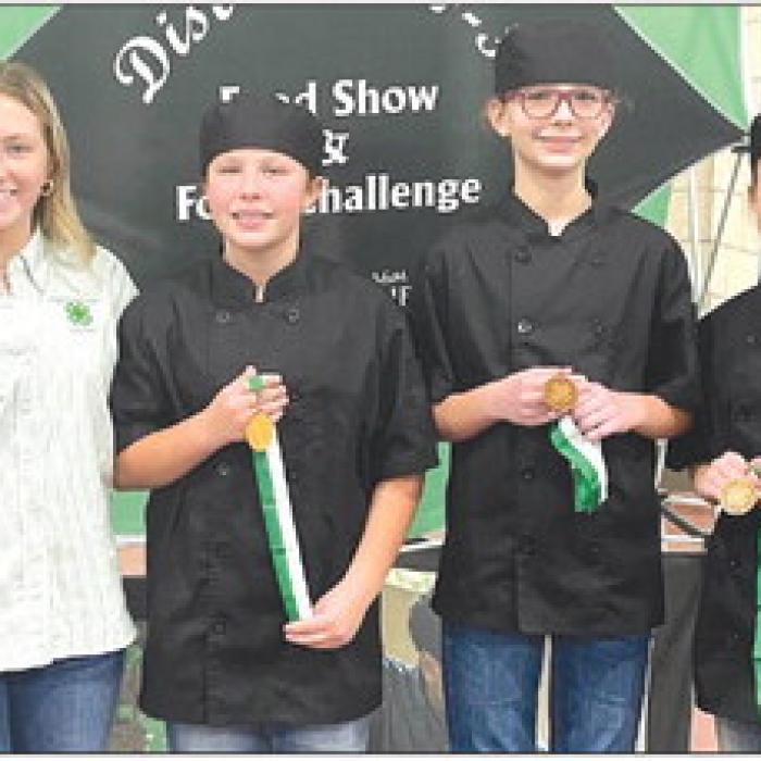 Simmer Down: District 11 4-H Council Officer, Ally Kibby, Tatum Fritsch, and Sawyer Mau.