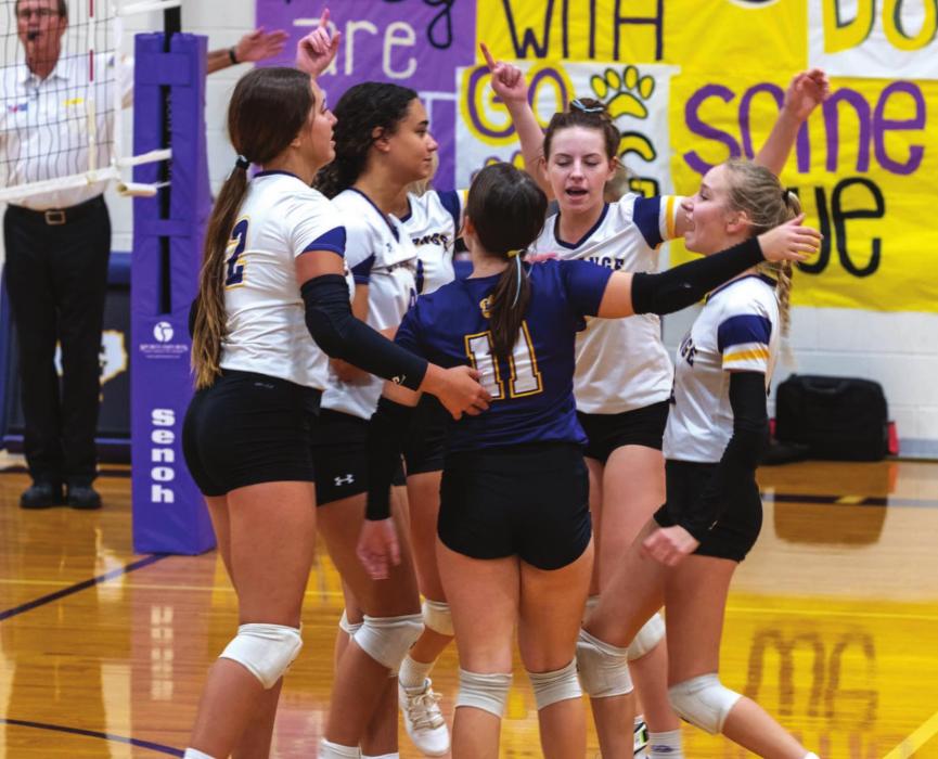 The La Grange volleyball team celebrates after scoring a point in Friday’s match against Austin Eastside Friday. Photos by Andy Behlen