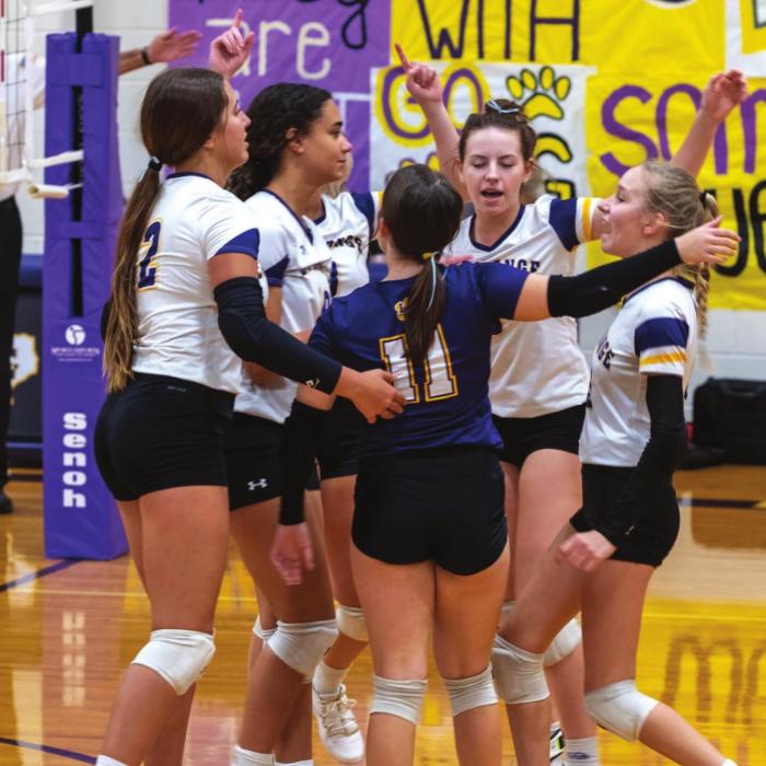 The La Grange volleyball team celebrates after scoring a point in Friday’s match against Austin Eastside Friday. Photos by Andy Behlen