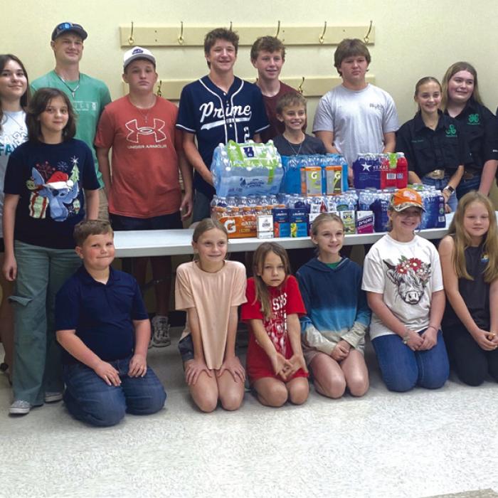 On Sunday, Nov. 17, the Pure Country 4-H Club donated water, Gatorade and electrolyte drinks to the Ellinger Volunteer Fire Department for their November service project. On hand to accept the donation representing the fire department was Brandon Karisch.