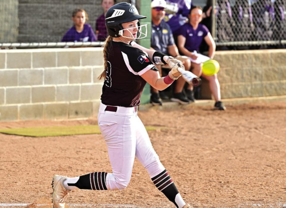 Flatonia’s Dallyn Bishop hits for The Lady Bulldogs Friday in Shiner where The Lady Bulldogs lost to the Lady Comanches. Photo by Stephanie Steinhauser