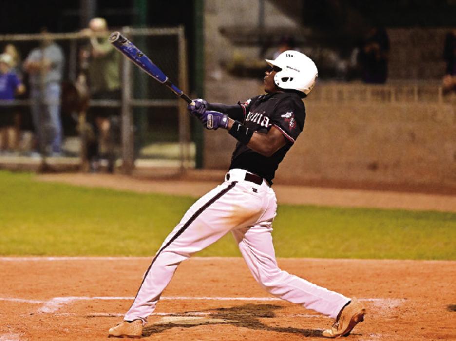 Keyshaun Green battles at the plate for Flatonia in Friday night’s game in Shiner. The Bulldogs suffered their first district loss in the season. Photo by Stephanie Steinhauser