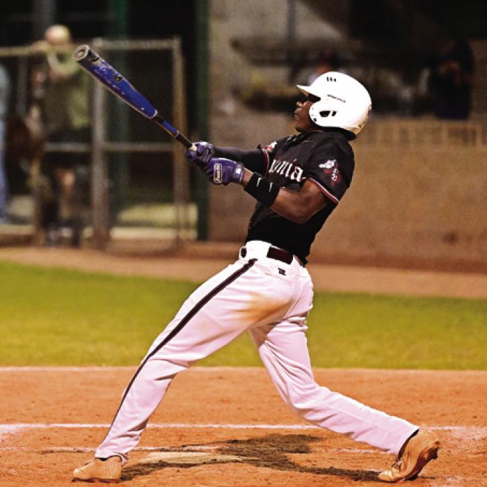 Keyshaun Green battles at the plate for Flatonia in Friday night’s game in Shiner. The Bulldogs suffered their first district loss in the season. Photo by Stephanie Steinhauser