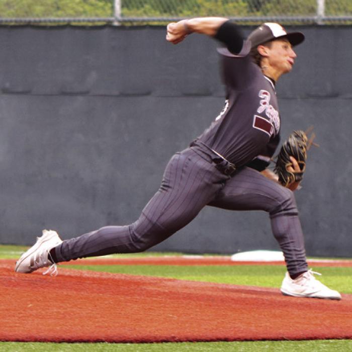 Fayetteville’s Travis Gully pitches in Tuesday’s game against Mumford. Photo by Ann Pape