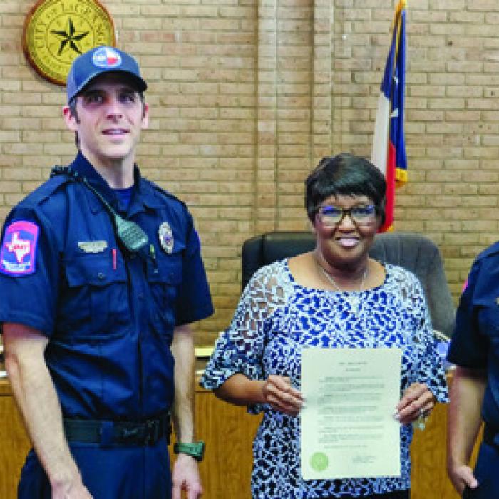 La Grange Mayor Jan Dockery signed a proclamation recognizing Fayette County EMS for being named EMS Agency of the Year by the Texas EMS Alliance. On hand for the signing were representatives from Fayette County EMS. Pictured are (from left) EMS Director Josh Vandever, Jarrett Bise, Nate Crowley, Mayor Dockery, Joseph Tavary, Alyssa Lang and Christina Sandoval. Photo by Andy Behlen