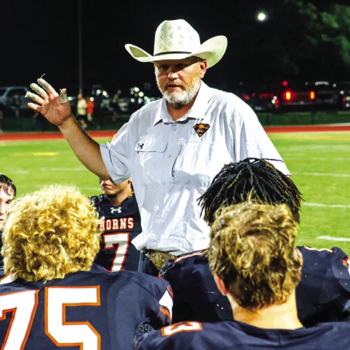 Schulenburg football coach Clay Ferguson talks to his players after a game last season, Ferguson’s first during which the Shorthorns went 6-6. Friday the school announced that Ferguson was being relieved of his head coaching and athletic director duties. Photo by Andy Behlen