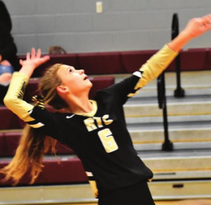 RT-C’s Jill Eilers gets ready to spike the ball in Monday’s match. Photos by Paul Kipp