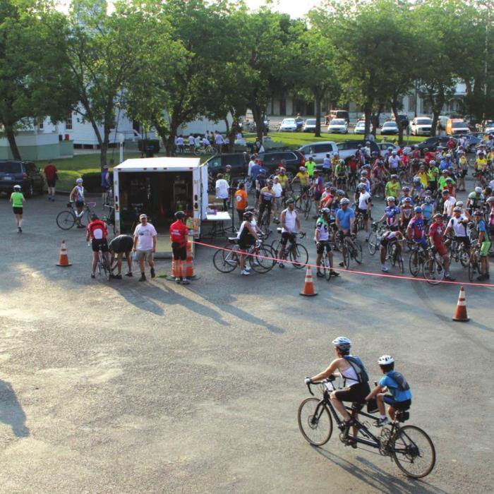 Folks line up at the town square in Fayetteville before a previous Good Old Summertime Classic Bike Ride event.