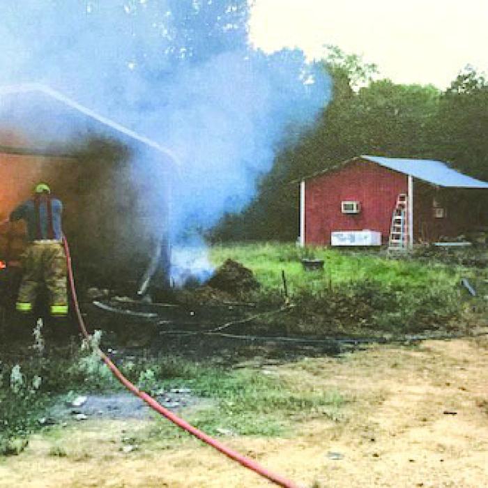 Vehicle, Carport Burn Near Smithville