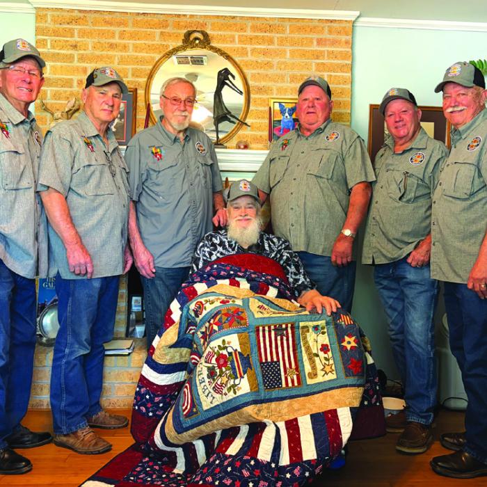 Presenting the quilt to Bob Baker were VVA 870 Members Eugene Krupala, Don Christen, Ron Dorsey, Daniel Kutac, Frank White and Andy Janda.