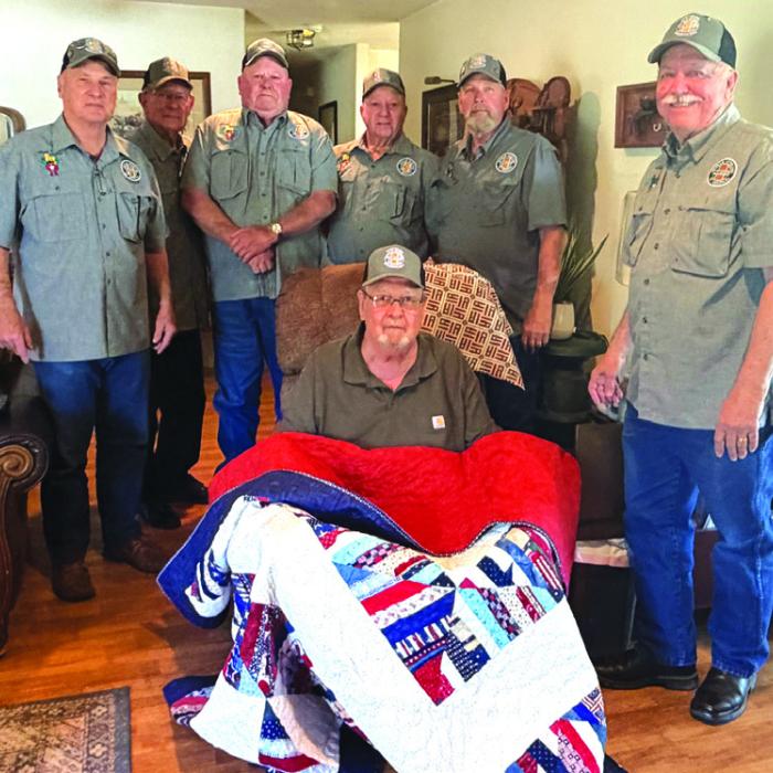 Presenting the quilt to John Dodson were VVA 870 Members Don Christen, Eugene Krupala, Daniel Kutac, Gerald Smith and Andy Janda.