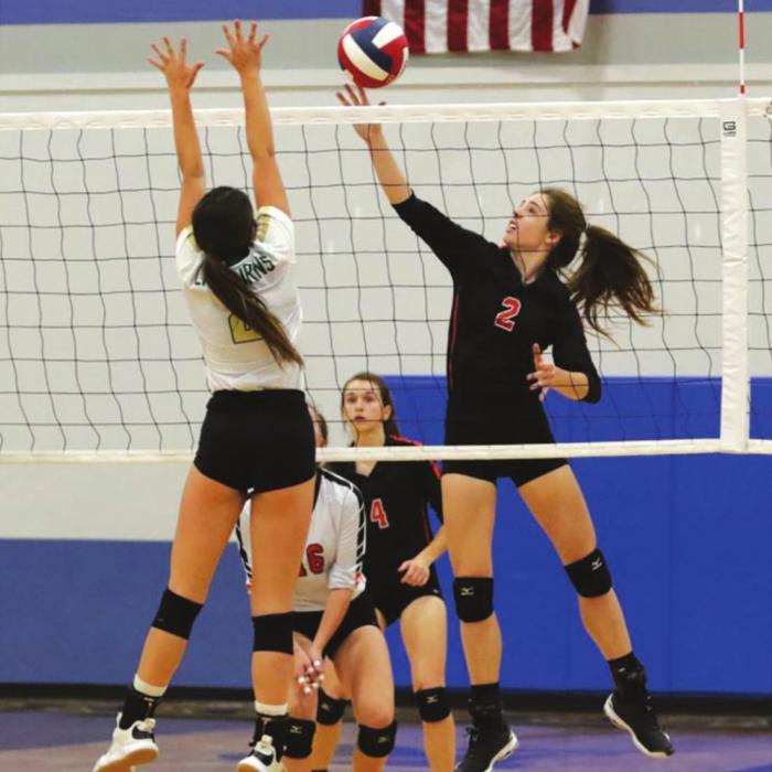 Schulenburg’s Claire Antosh spikes a ball in Tuesday’s regional semifinal match. Photos by Audrey Kn’stynik