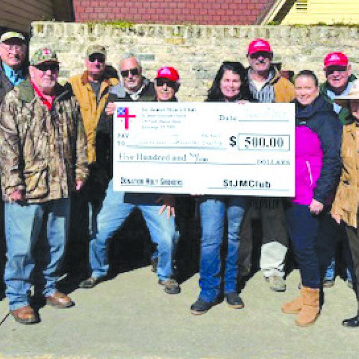 St. James’ Holy Smokers presented a check to the Gardenia E. Janssen Animal Shelter’s Executive Director, Teresa Brown, Volunteer Coordinator, Lisa Slinkard, and Board Secretary, Ann Rauch.