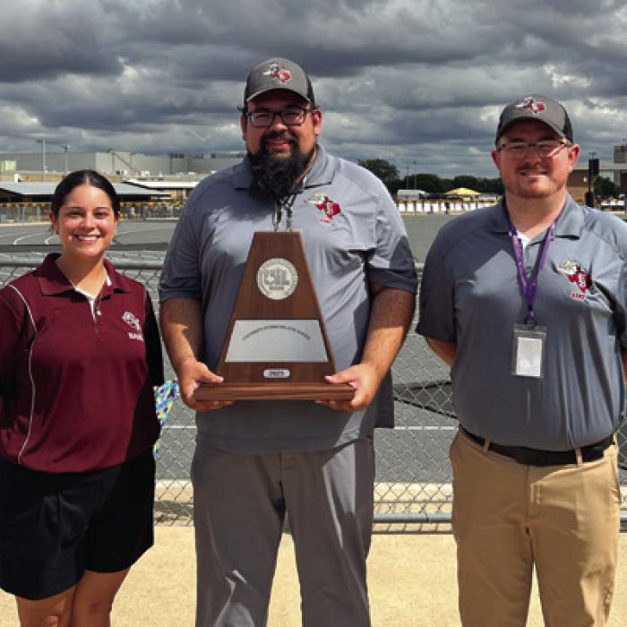 Pictured are the Flatonia Band Staff: (from left) Color Guard Instructor Amanda Bass, Director of Bands Justin Bartlett, and Assistant Band Director Kyle Lane.