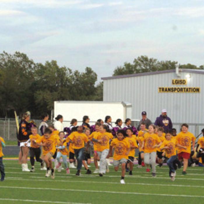 Lots of kiddos participated in the Booster Club’s Little Leps Tunnel Run prior to last Friday’s La Grange football game. Elementary kids got to run out on the field just like the varsity Leps. Photo by Jeff Wick