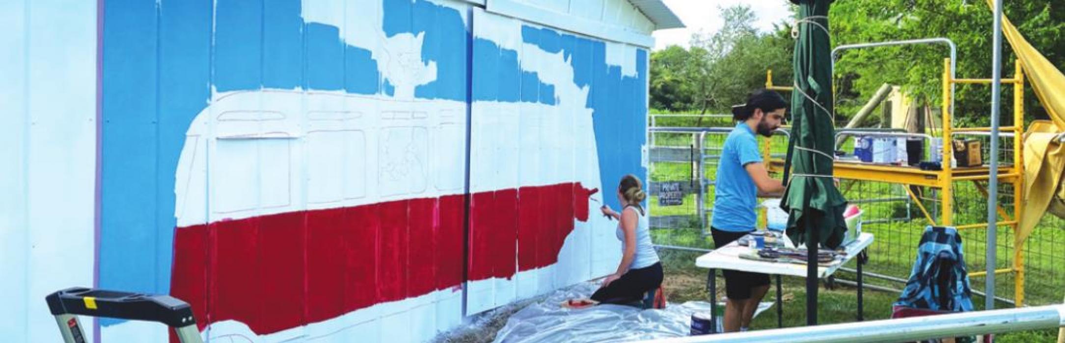 Austin Artists Highlight Local Celebrity Alpacas in Holman Barn Mural